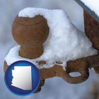 arizona map icon and a rusty, snow-covered trailer hitch