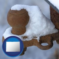 colorado map icon and a rusty, snow-covered trailer hitch