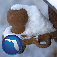 florida map icon and a rusty, snow-covered trailer hitch