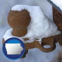 iowa map icon and a rusty, snow-covered trailer hitch