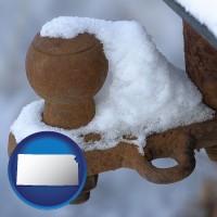 kansas map icon and a rusty, snow-covered trailer hitch