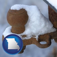 missouri map icon and a rusty, snow-covered trailer hitch
