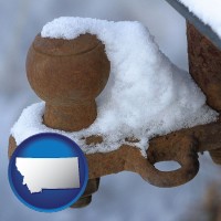 montana map icon and a rusty, snow-covered trailer hitch