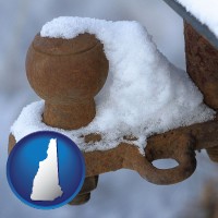 new-hampshire map icon and a rusty, snow-covered trailer hitch