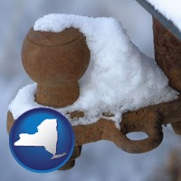 new-york map icon and a rusty, snow-covered trailer hitch