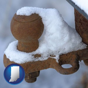 a rusty, snow-covered trailer hitch - with Indiana icon